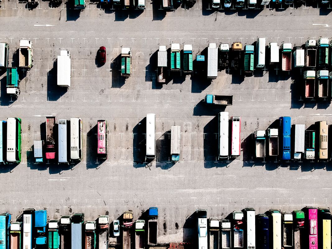 Truck parking Photo by Christian Chen on UnsplashPicture